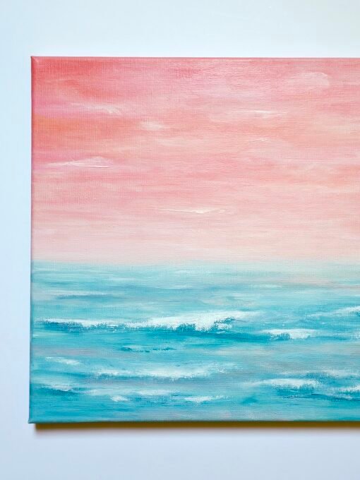 An abstract seascape acrylic painting featuring beautiful peach sunset sky with the horizon blending softly into the teal waters of the ocean.